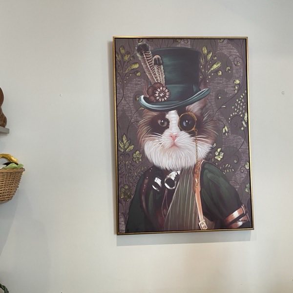 Schilderij in de winkel naast de chocoladerekken
