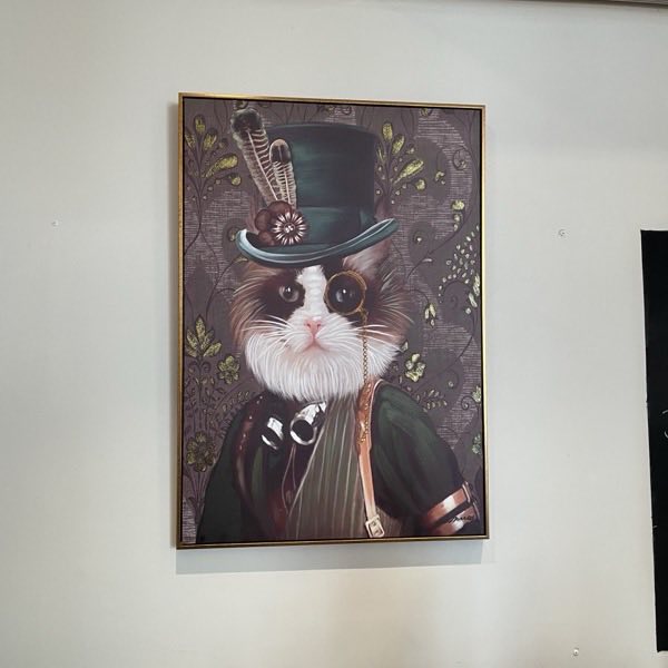 Schilderij aan de muur van de chocolaterie